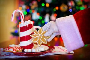 Santa, taking a cookie